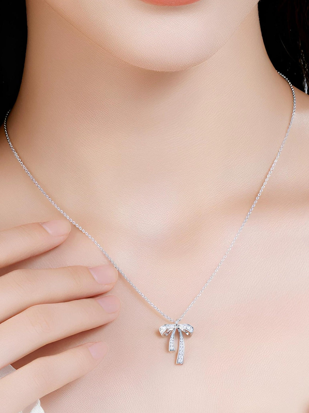 SILVER BOW COLLARBONE NECKLACE