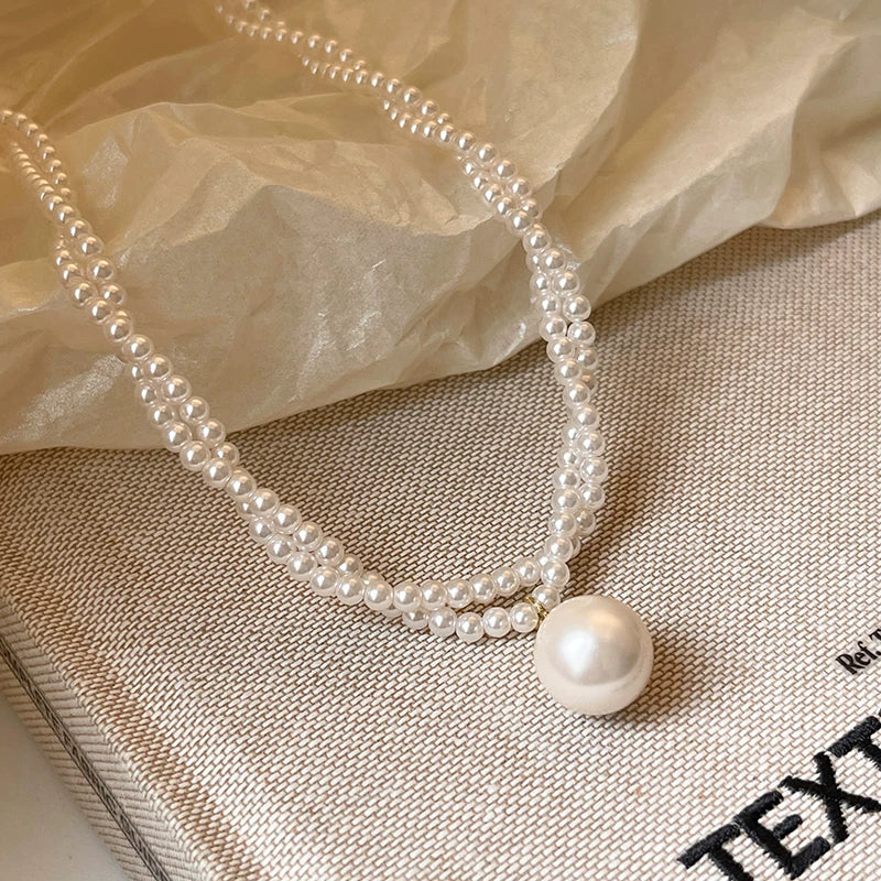 TWISTED PEARL SWEATER CHAIN