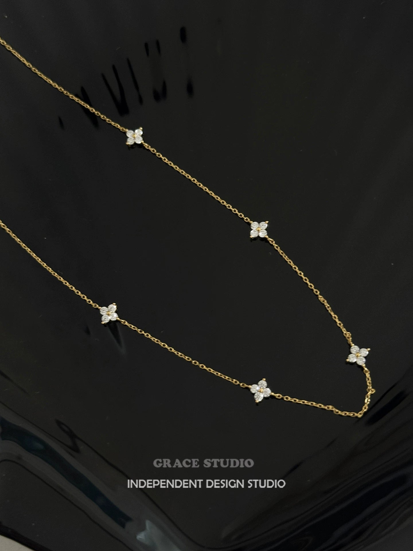 STERLING SILVER CLOVER NECKLACE
