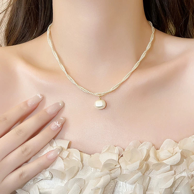 TWISTED PEARL SWEATER CHAIN