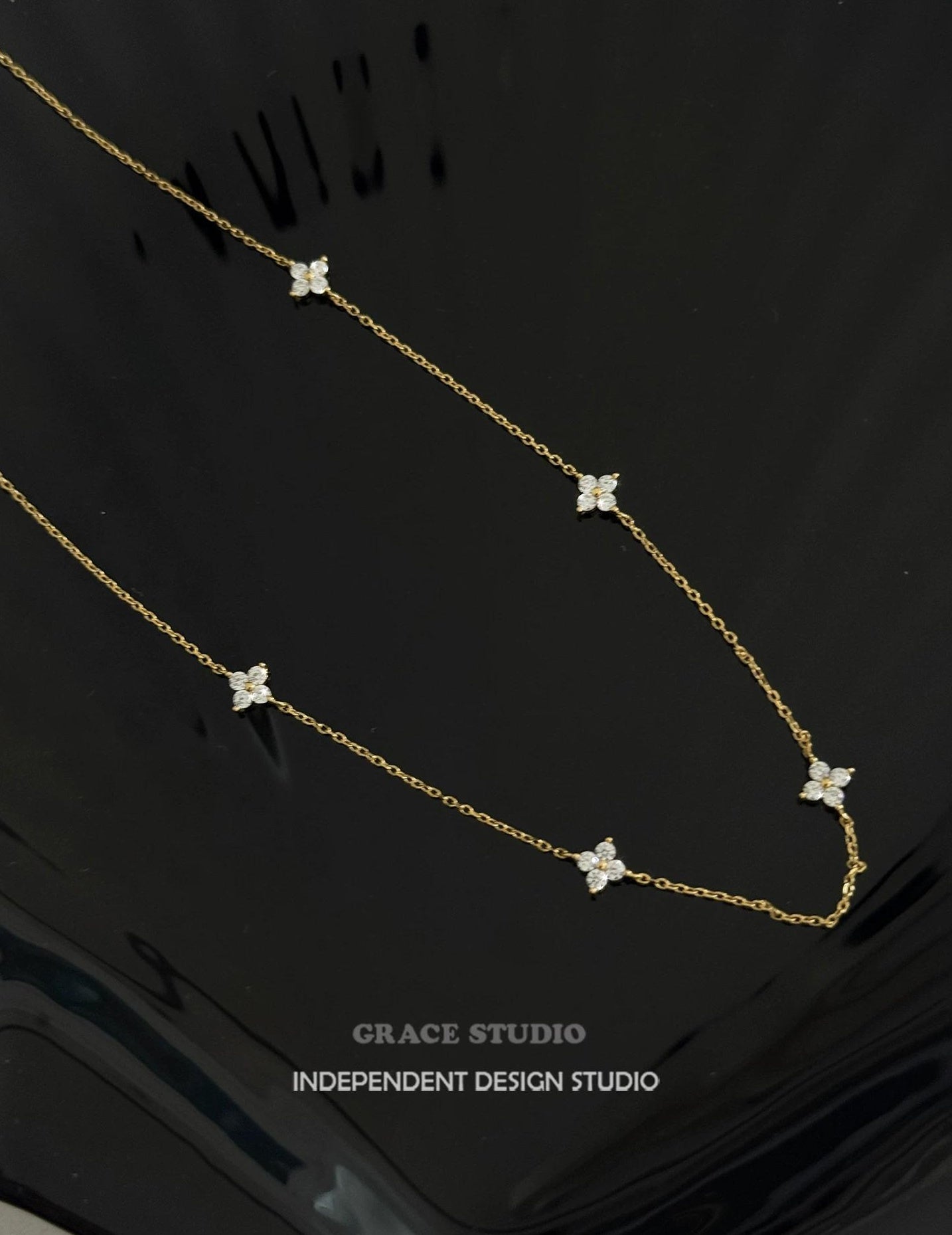 STERLING SILVER CLOVER NECKLACE