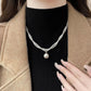 TWISTED PEARL SWEATER CHAIN