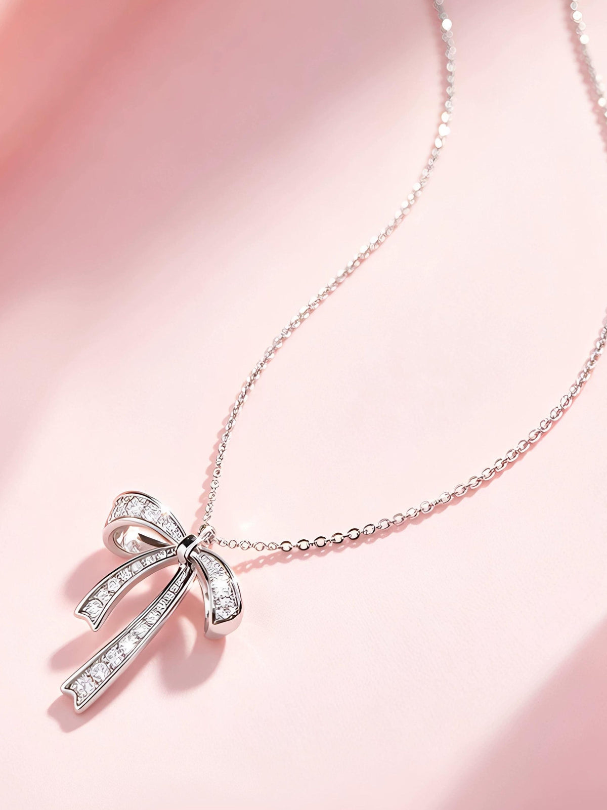 SILVER BOW COLLARBONE NECKLACE